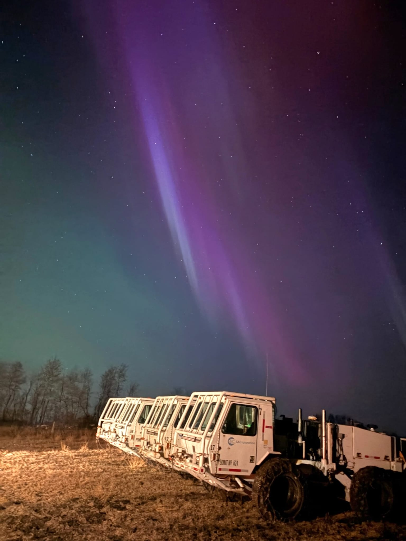 Seismic Source field operation under northern lights